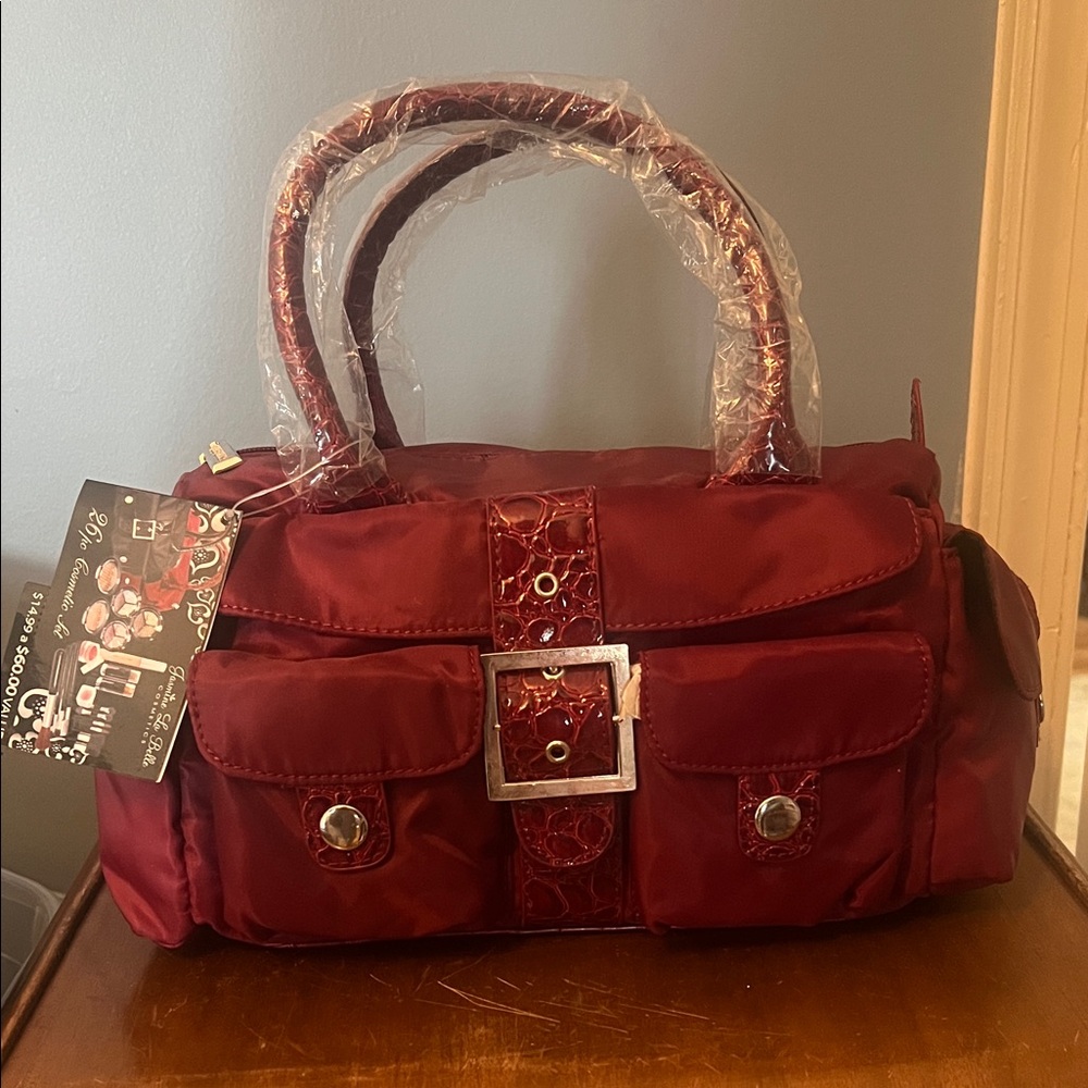 New with tag  Burgundy Travel Make Up Bag